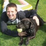 kids volunteering with dog