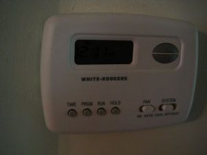 Use a programmable thermostat to lower heating costs