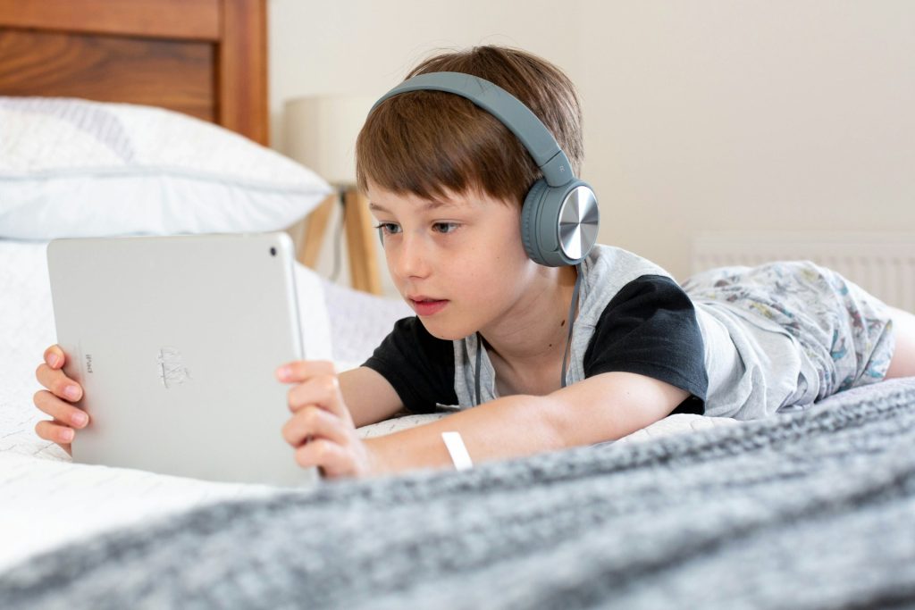 child looking at ipad